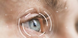 Dlaczego warto stosować soczewki całodobowe? Eye monitoring and treatment in medical. Biometric scan of male eye closeup.