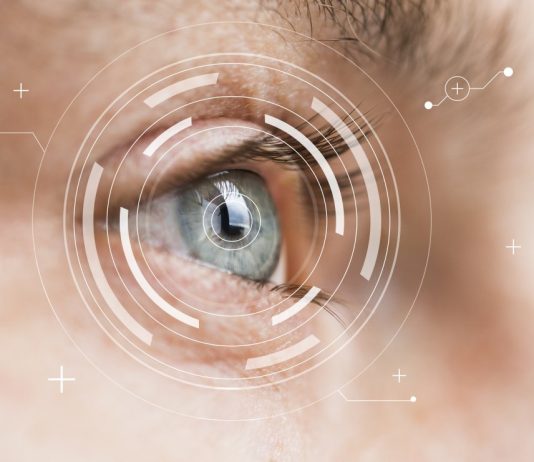 Dlaczego warto stosować soczewki całodobowe? Eye monitoring and treatment in medical. Biometric scan of male eye closeup.